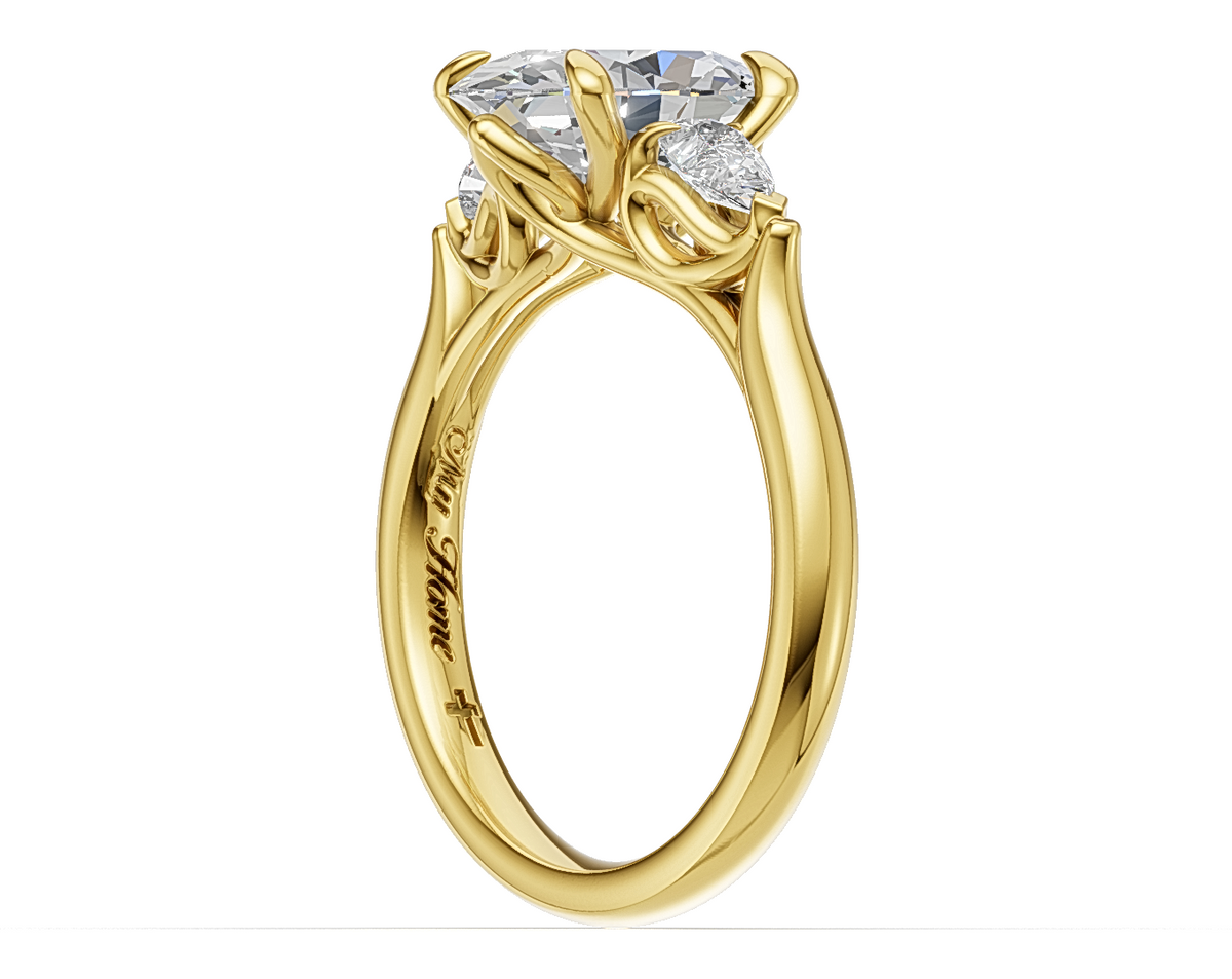 Oval Brilliant and Pear-Cut Diamond Trilogy Engagement Ring