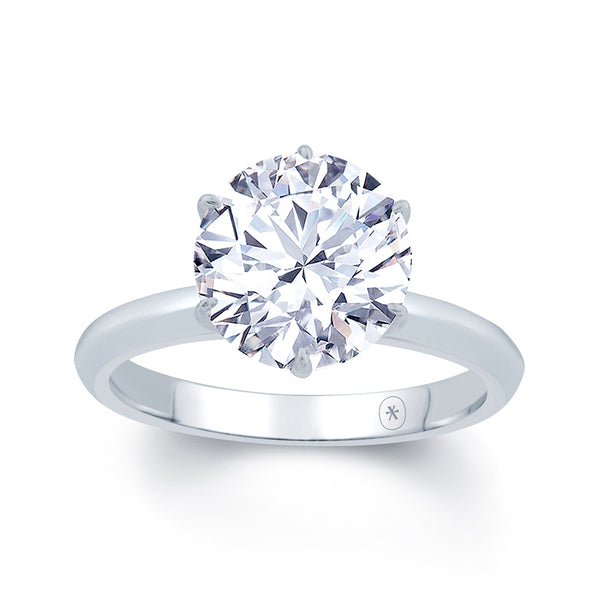 Round Six Claw Peg Head Solitaire Engagement Ring