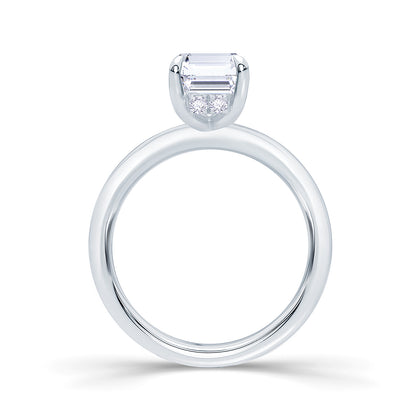 emerald-hidden-halo-peg-head-engagement-ring