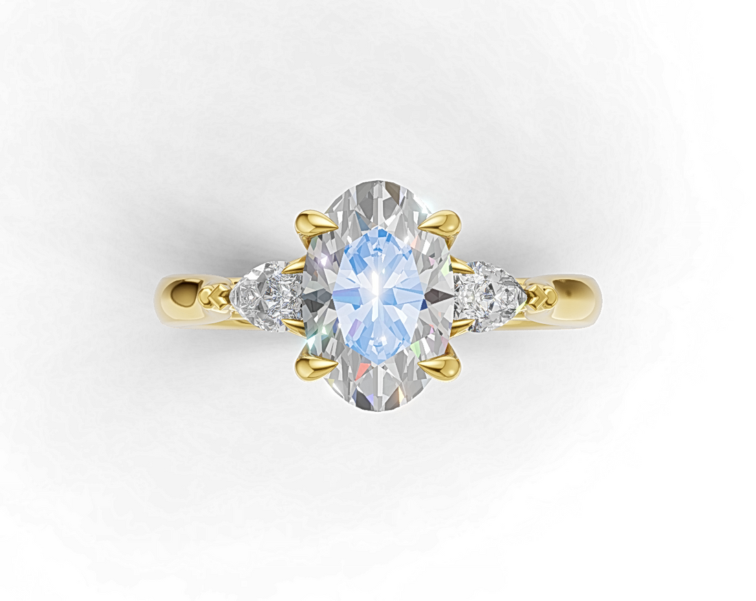 Oval Brilliant and Pear-Cut Diamond Trilogy Engagement Ring